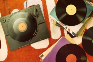 vintage Portable Record Player on orange carpet